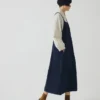 Abito salopette in denim con tasche applicate