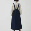 Abito salopette in denim con tasche applicate