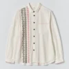 Camicia in cotone ricamata a punto croce Camicia in cotone ricamata a punto croce