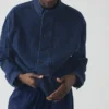 Camicia in denim con colletto alla coreana e mezza abbottonatura Camicia in denim con colletto alla coreana e mezza abbottonatura