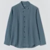 Camicia in lino con bottone ad anello Camicia in lino con bottone ad anello