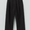 Pantaloni con pieghe sul davanti in cotone e lana a spina di pesce Pantaloni con pieghe sul davanti in cotone e lana a spina di pesce