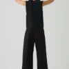 Pantaloni con pieghe sul davanti in cotone e lana a spina di pesce Pantaloni con pieghe sul davanti in cotone e lana a spina di pesce