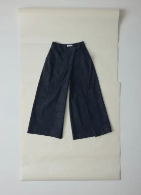 Pantaloni culotte in denim a pieghe