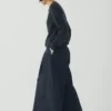 Pantaloni culotte in denim a pieghe