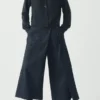 Pantaloni culotte in denim a pieghe