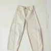 Pantaloni in denim con cuciture scultoree