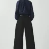 Pantaloni in denim con pieghe sul davanti Pantaloni in denim con pieghe sul davanti