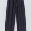 Pantaloni in lino tinti in capo con coulisse Pantaloni in lino tinti in capo con coulisse