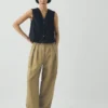 Pantaloni in misto cotone e lino a righe con pieghe sul davanti