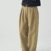 Pantaloni in misto cotone e lino a righe con pieghe sul davanti