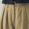 Pantaloni in misto cotone e lino a righe con pieghe sul davanti