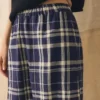 Pantaloni in misto lino e cotone a quadri con gamba a zampa | Blu/Soia