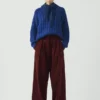 Pantaloni in velluto a coste biologico con pieghe sul davanti Pantaloni in velluto a coste biologico con pieghe sul davanti