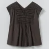Top in cotone smockato a contrasto Top in cotone smockato a contrasto