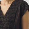 Top in cotone smockato a contrasto Top in cotone smockato a contrasto
