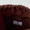 Zaino con fiocco in cotone cerato di Kate Sheridan Zaino con fiocco in cotone cerato di Kate Sheridan